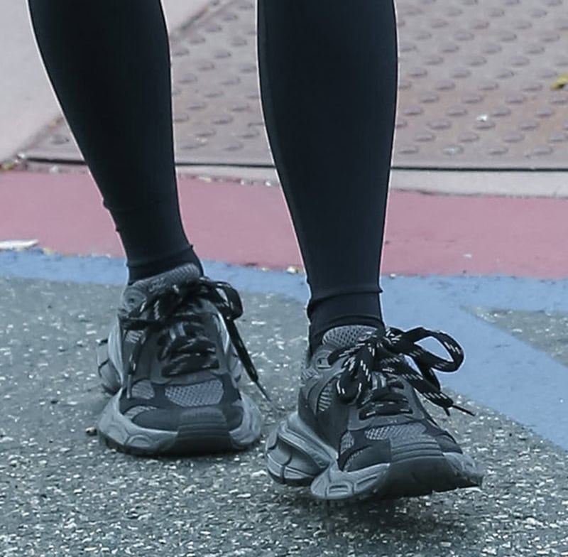 Kim Kardashian completes her sporty look with the Balenciaga 3XL sneakers in gray and black colorway