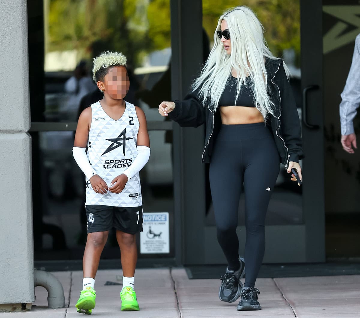 Kim Kardashian and son Saint wear matching platinum hair on their way to the Sports Academy in Los Angeles
