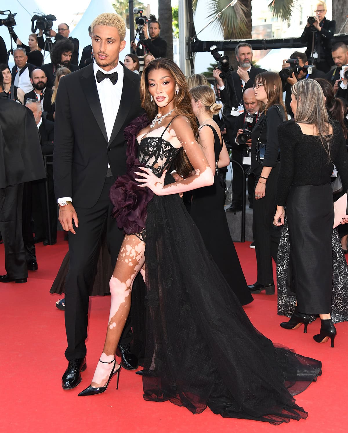 Kyle Kuzma opts for a dapper look in a black Armani tuxedo suit with a crisp white shirt and a bow tie, styled with a $450,000 F.P.Journe Tourbillon Souverain Vertical watch