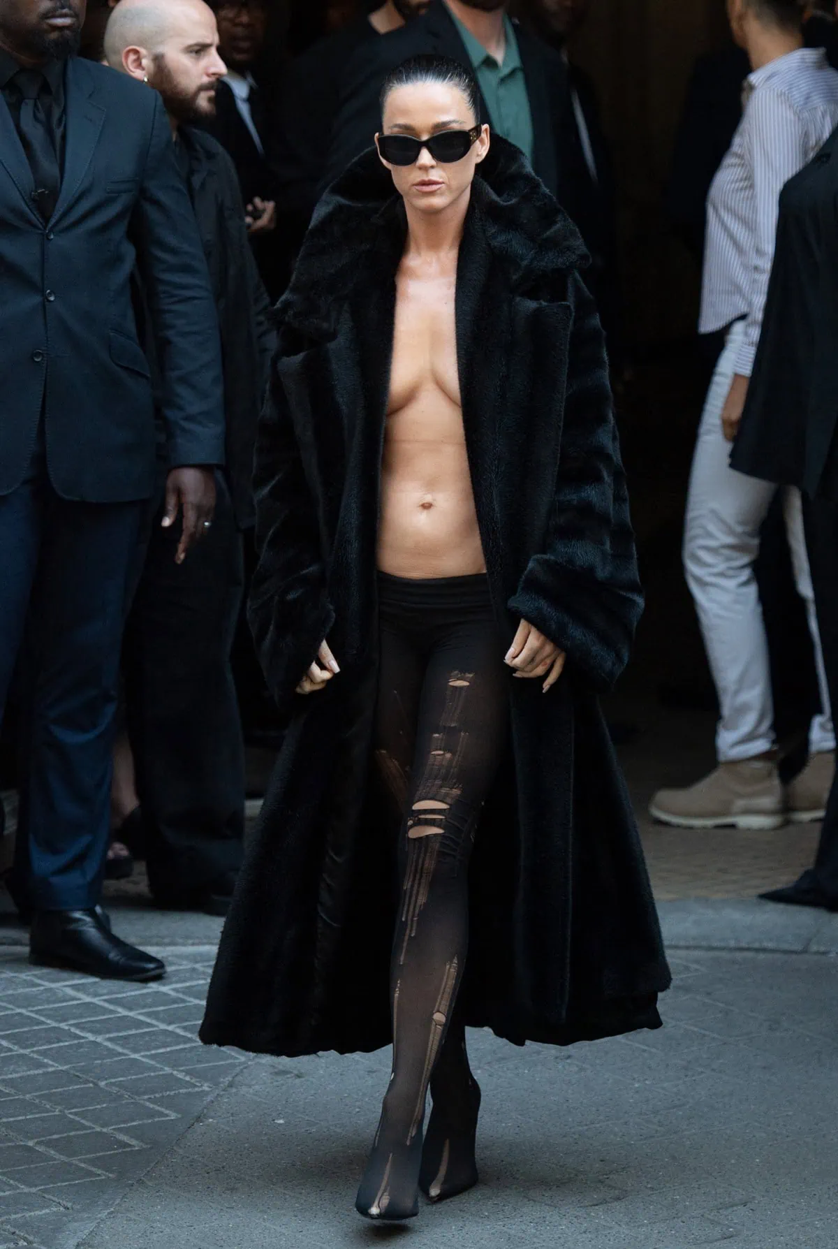 Topless under a Balenciaga coat, Katy Perry makes a bold fashion statement at the Balenciaga Haute Couture Fall/Winter 2024-2025 show
