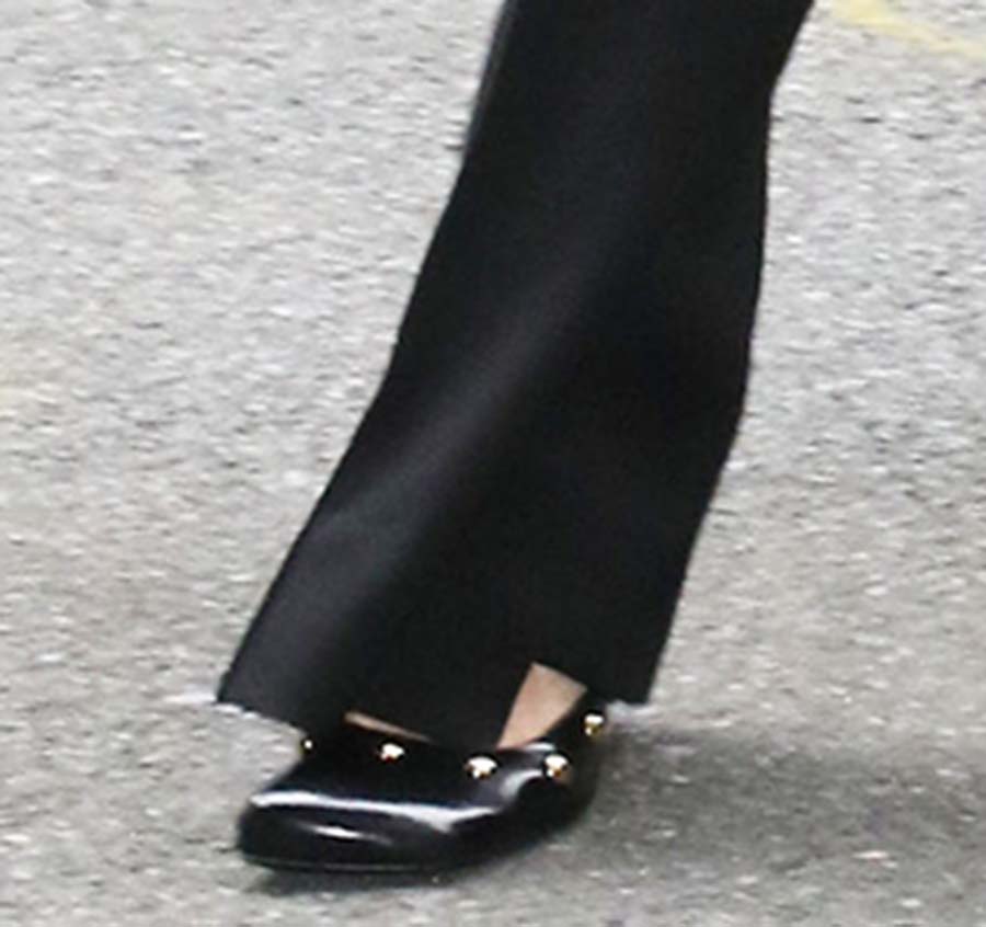 Daisy Edgar-Jones pairs her sultry businesswear with studded black Chloe "Jade" pumps