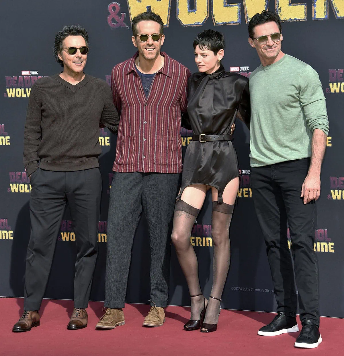 Shawn Levy, Ryan Reynolds, Emma Corrin, and Hugh Jackman at a Deadpool & Wolverine fan event at the Uber Arena in Berlin