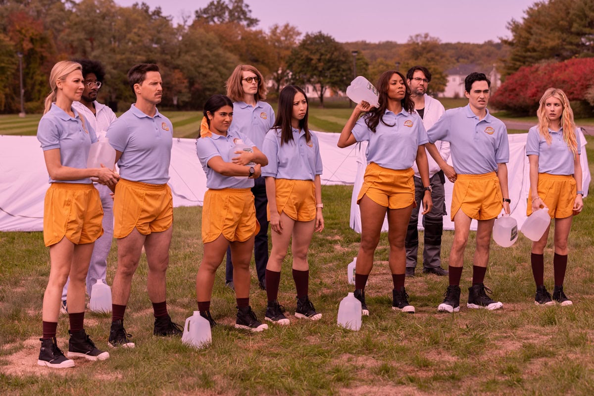 The main cast of "Space Cadet," featuring Desi Lydic as Dr. Stacy Kellogg, Andrew Call as Captain Jack Mancini, Kuhoo Verma as Violet Marie Vislawski, Josephine Huang, Yasha Jackson as Grace Jackson, Troy Iwata as Hector Kaneko, and Emma Roberts as Rex Simpson, is pictured during a training scene