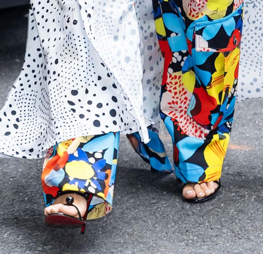 Blake Lively pairs her whimsical mix print ensemble with black Christian Louboutin Atonana sandals