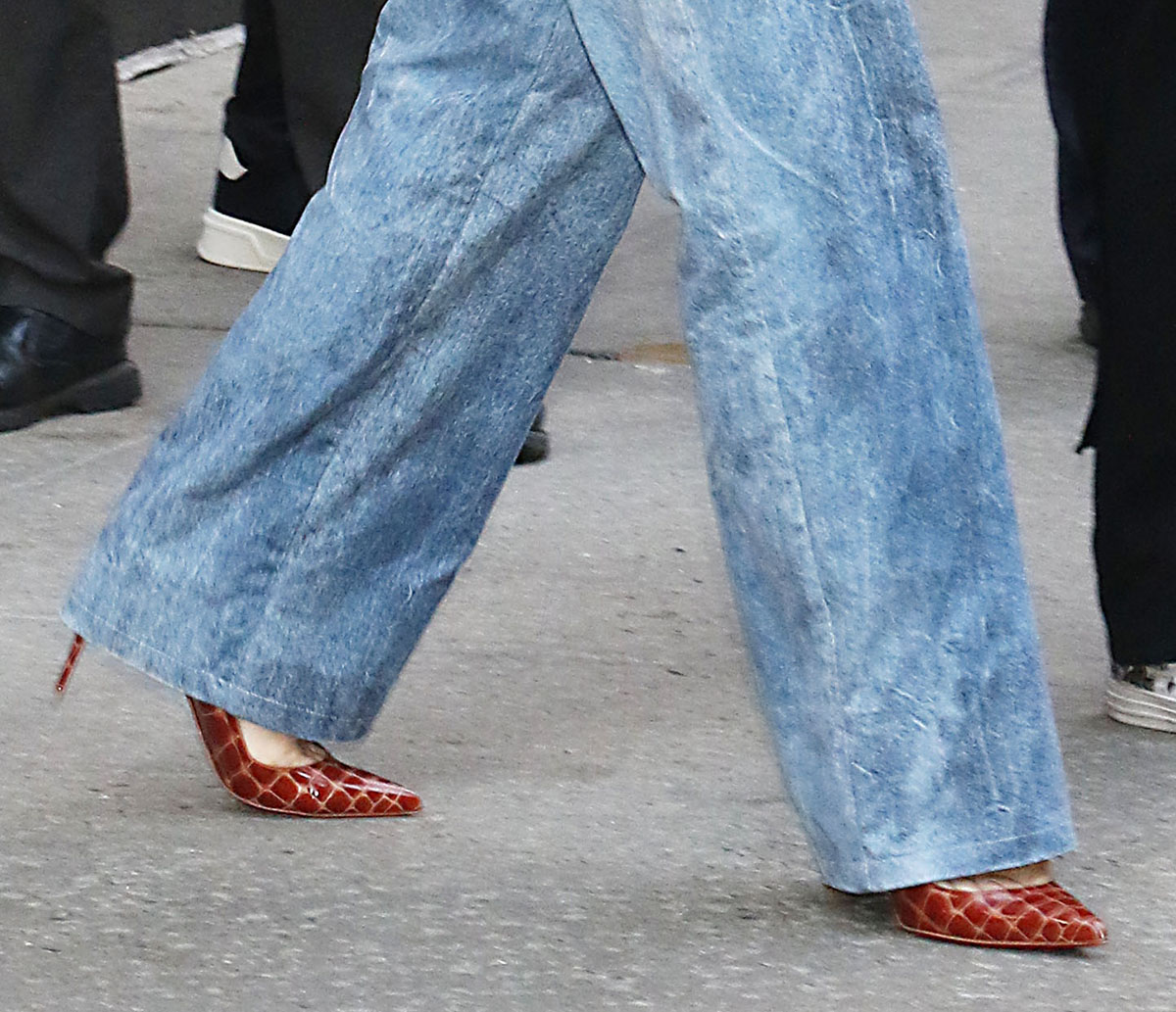 Cate Blanchett teams her double-denim ensemble with brown faux croc pointed-toe Kate pumps by Christian Louboutin