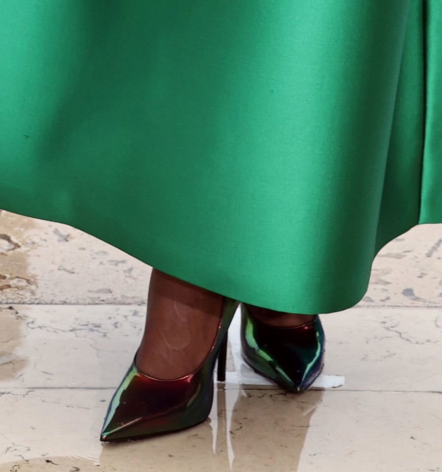 Cynthia Erivo teams her green dress with iridescent pointy pumps that mirror her gown's green color