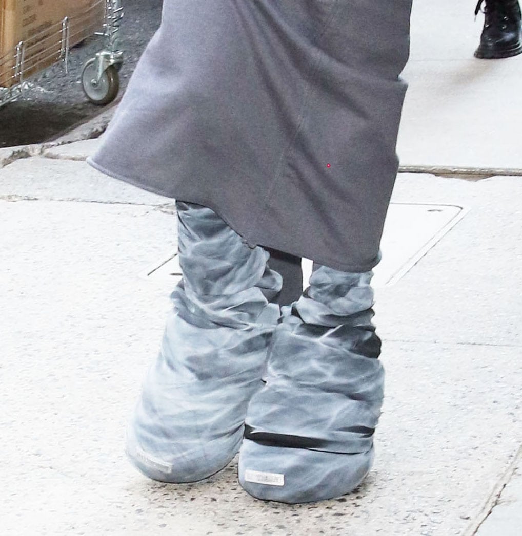 FKA Twigs pairs her gray Dune-style outfit with chunky gray Han Kjøbenhavn Mono boots