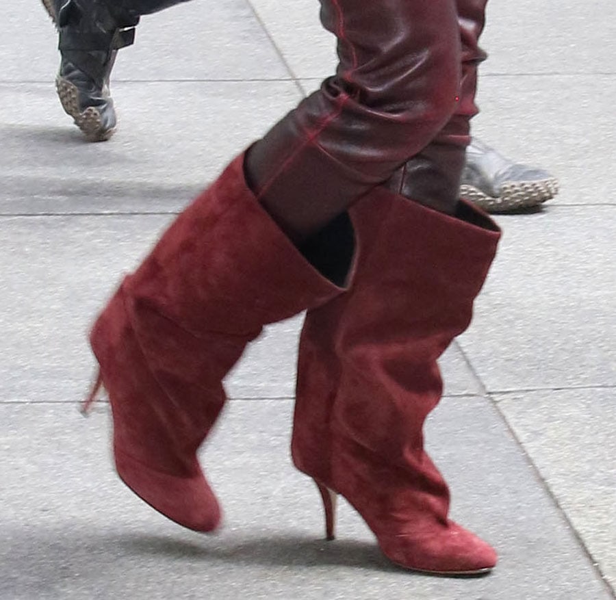 FKA Twigs complements her burgundy outfit with maroon Paris Texas Esther slouchy boots