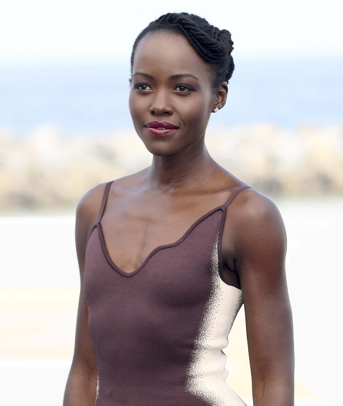 Lupita Nyong'o wears De Beers earrings and the same sister locs hairstyle at The Wild Robot photocall during the 72nd San Sebastian International Film Festival