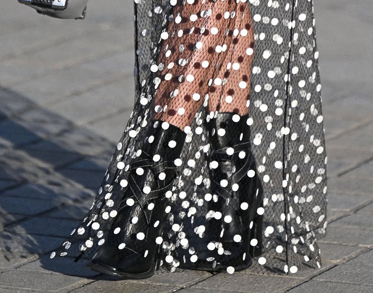 Alicia Vikander completes her chic but comfy Paris Fashion Week outfit with the Louis Vuitton Berlin ankle boots featuring a signature knot detail and silver-toned buckle