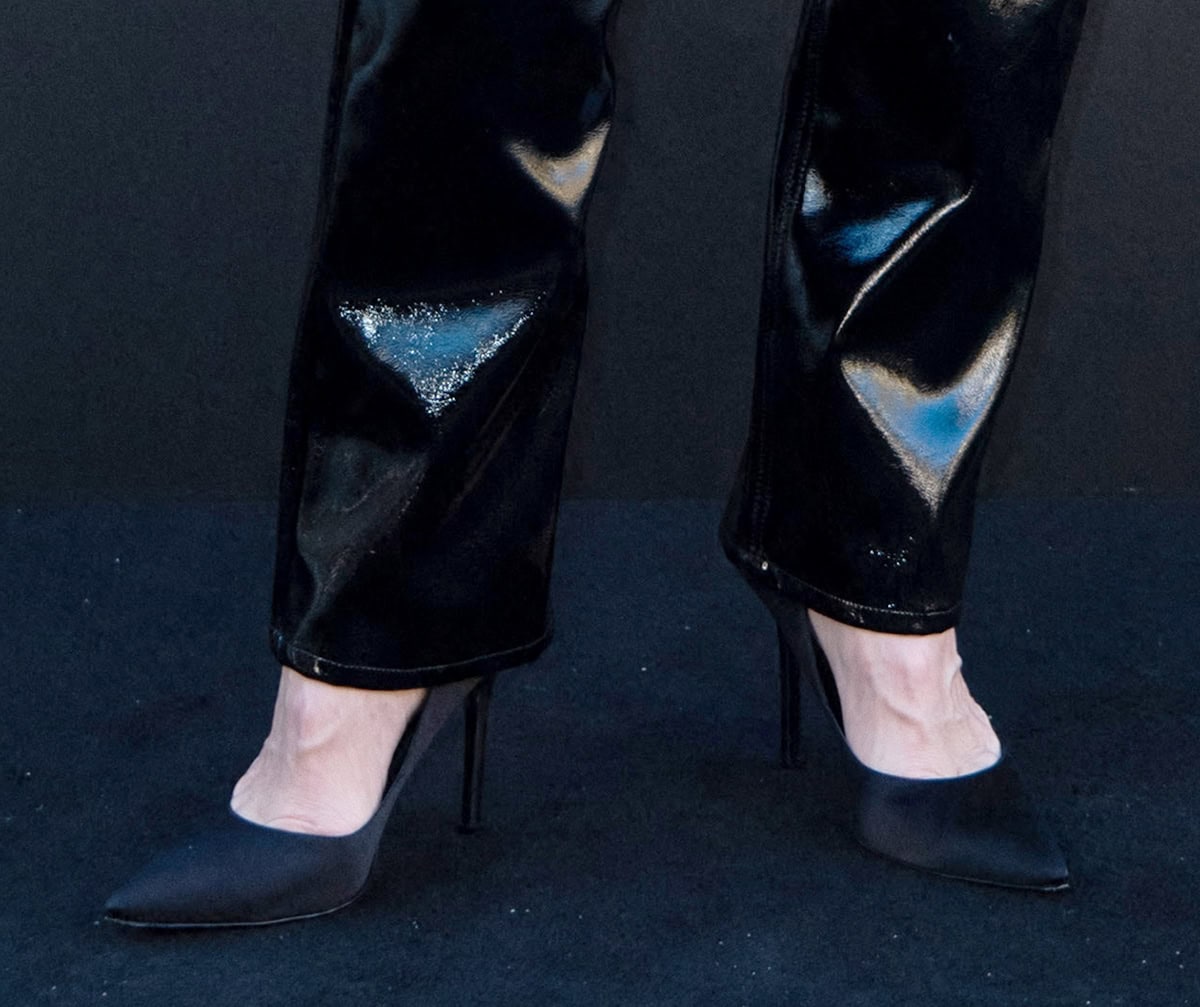 Cate Blanchett completes her refined look with classic black pointed-toe stiletto pumps