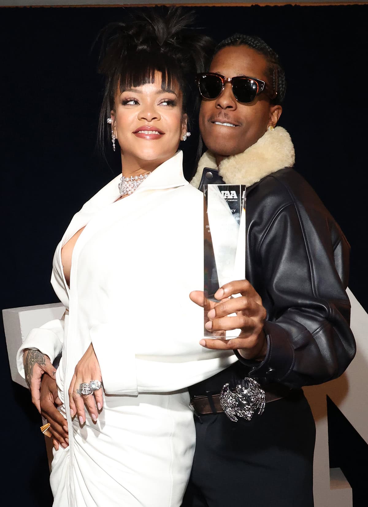 Rihanna accessorizes with 18k white gold, diamond, and pearl earrings and necklace from the Mikimoto x Chrome Hearts collection