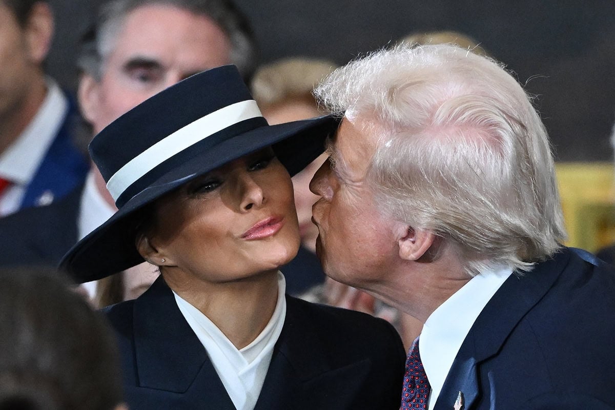 Melania Trump completes her sophisticated military-style ensemble with a wide-brimmed Eric Javits hat