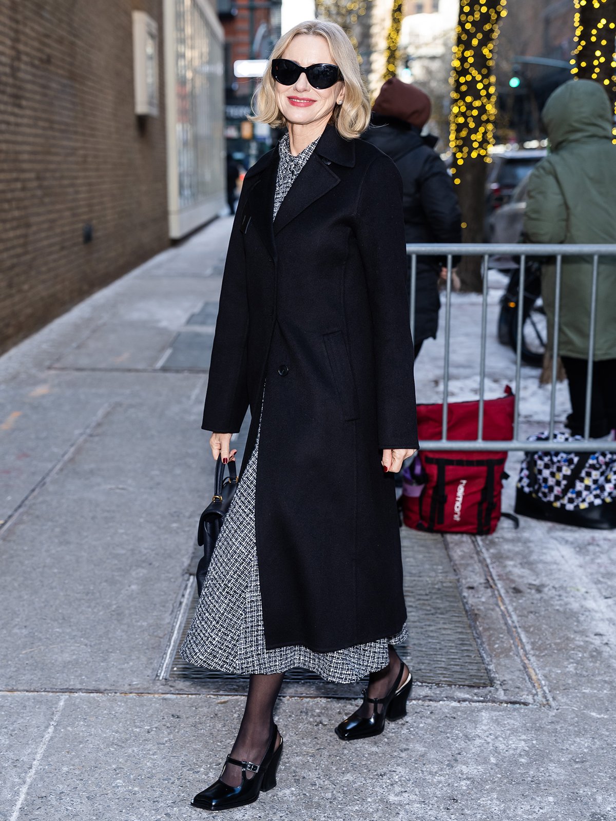 Naomi Watts drops by the Today show in an exquisitely tailored Emilia Wickstead boucle tweed dress with a nipped-in waist and an A-line skirt