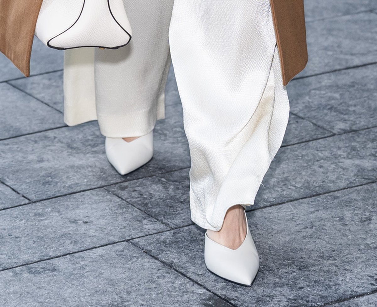 Naomi Watts opts for sleek and minimalist white d'Orsay pumps by Patrizia Pepe outside Hudson Yards