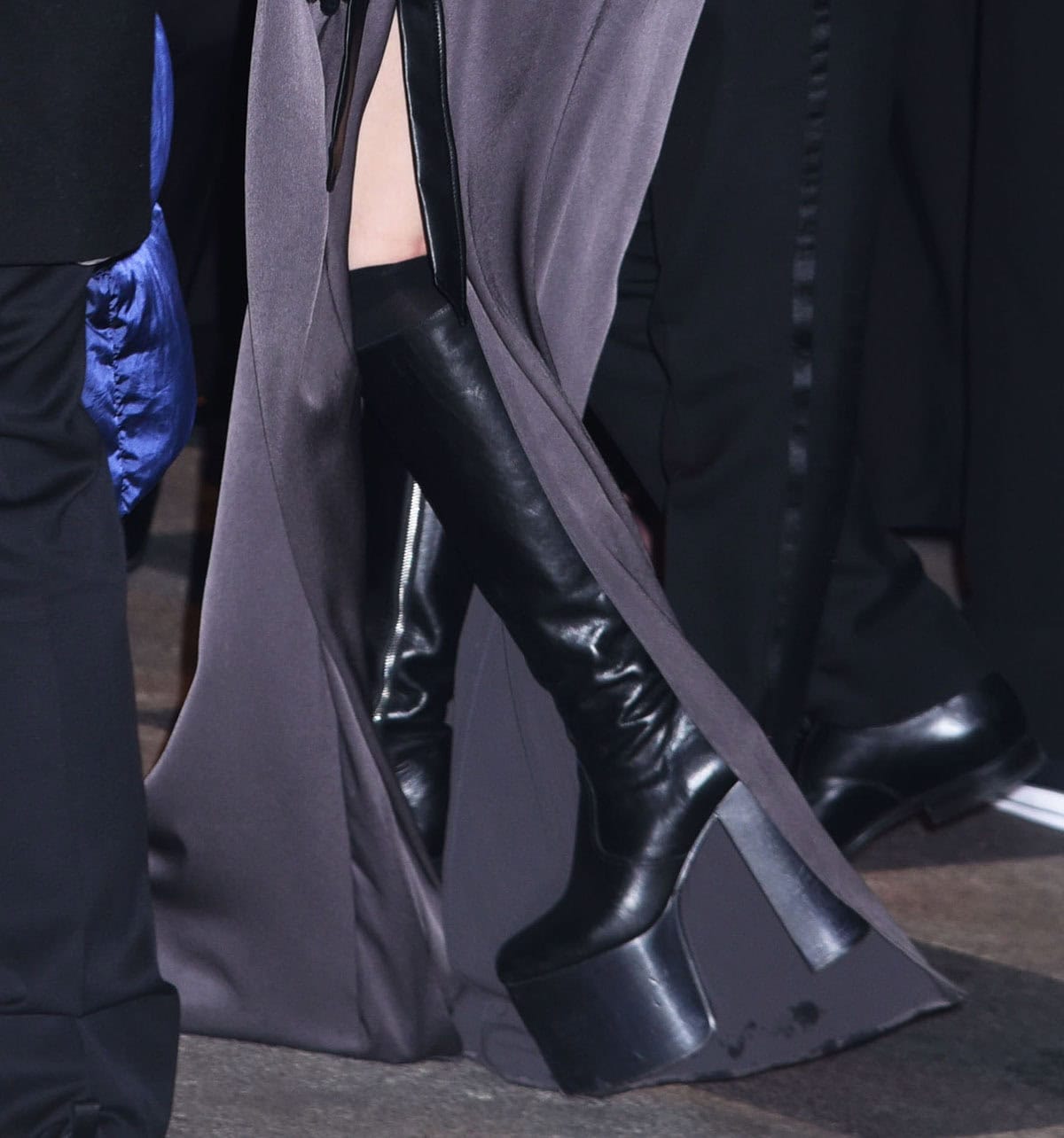 Lady Gaga embraces her penchant for quirky footwear, wearing Enfants Riches Deprimes boots with wood platforms and block heels