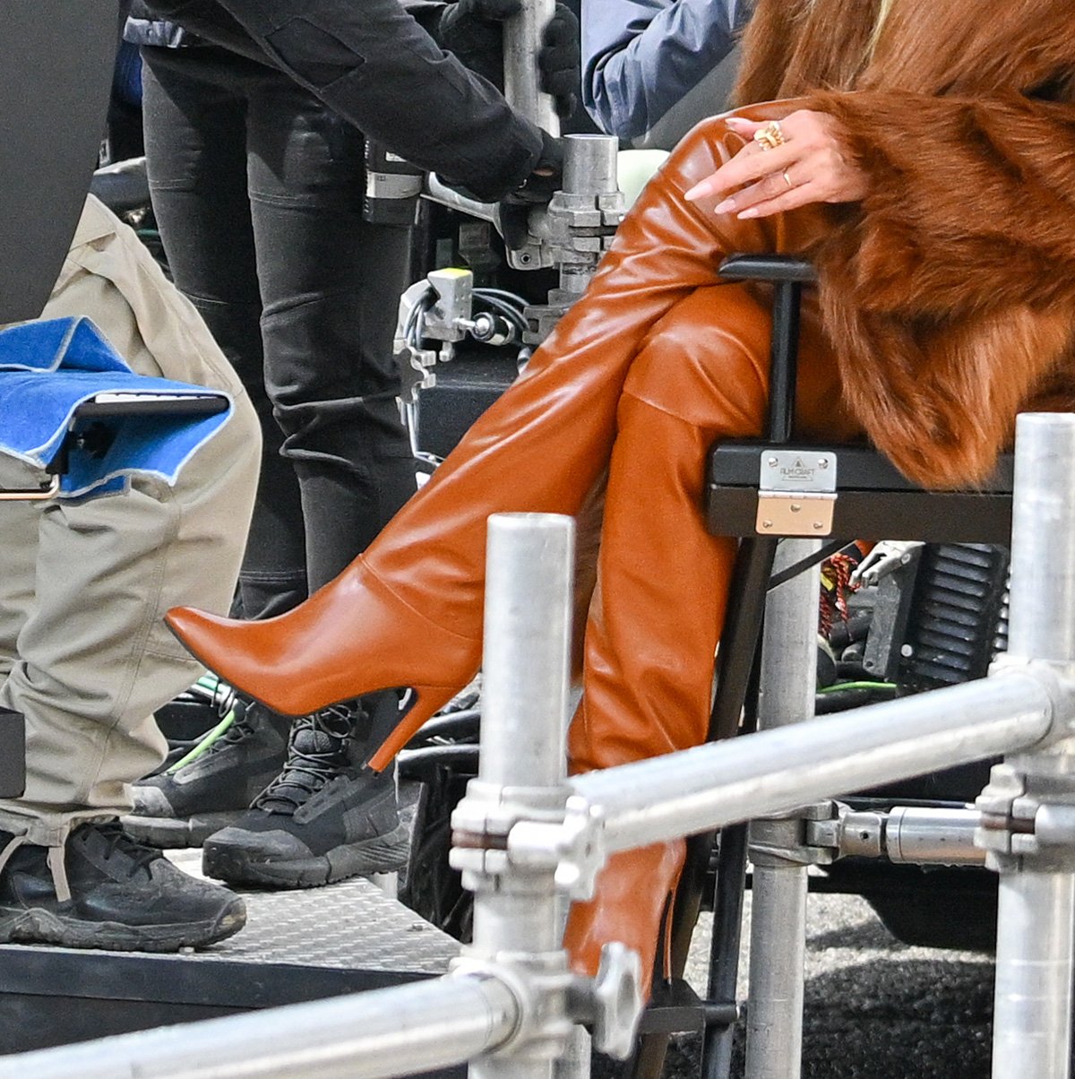 Heidi Klum exudes bohemian glamour in her earthy brown cognac thigh-high boots